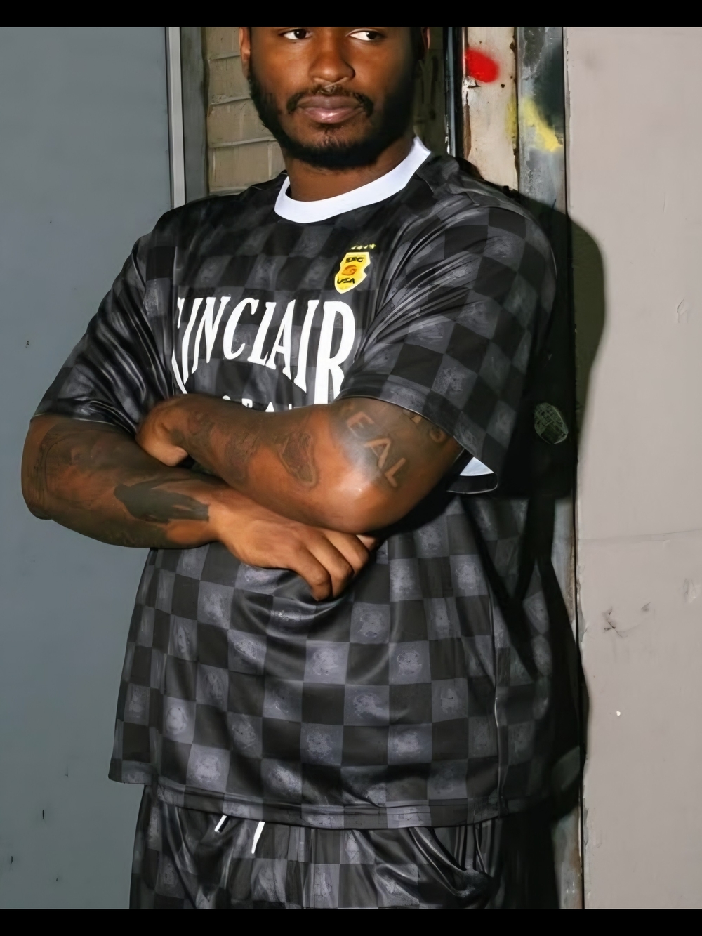 Sinclair Black Checkered Short-Sleeve Jersey with Crest